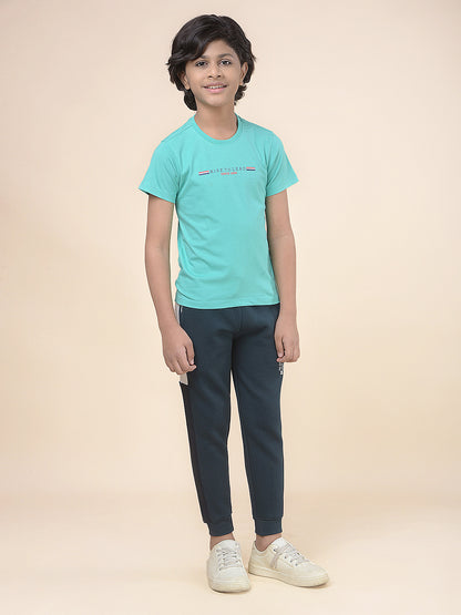 Casual Trackpant for Boys l Breathable & Soft with Color Fastness Regular Fit Fleece Fabric Self Design Pattern Drawstring Closure