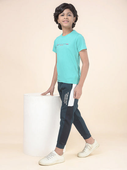 Casual Trackpant for Boys l Breathable & Soft with Color Fastness Regular Fit Fleece Fabric Self Design Pattern Drawstring Closure