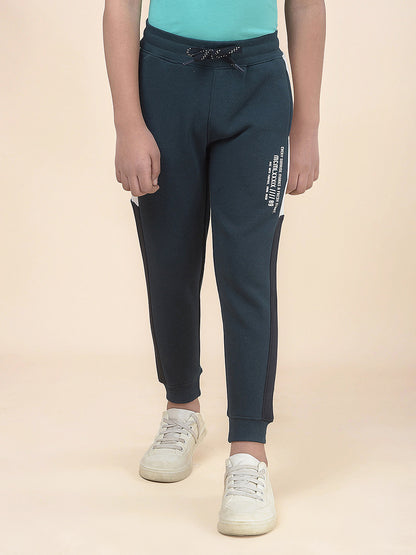 Casual Trackpant for Boys l Breathable & Soft with Color Fastness Regular Fit Fleece Fabric Self Design Pattern Drawstring Closure