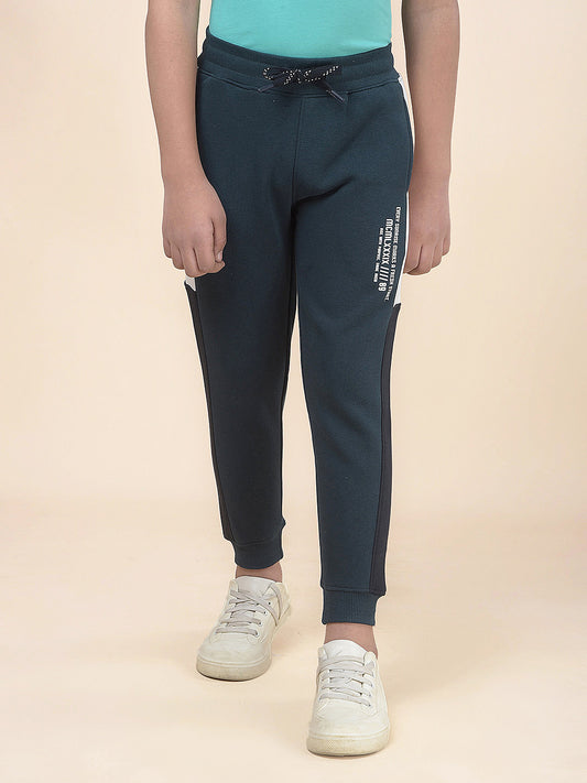 Casual Trackpant for Boys l Breathable & Soft with Color Fastness Regular Fit Fleece Fabric Self Design Pattern Drawstring Closure