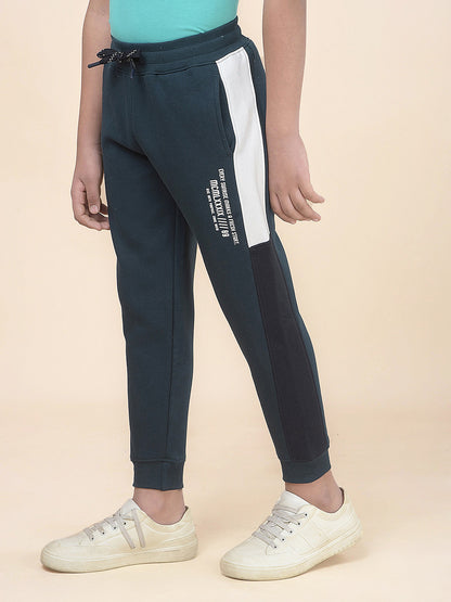 Casual Trackpant for Boys l Breathable & Soft with Color Fastness Regular Fit Fleece Fabric Self Design Pattern Drawstring Closure
