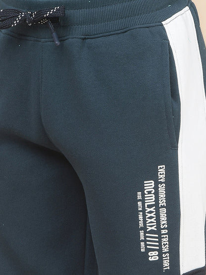 Casual Trackpant for Boys l Breathable & Soft with Color Fastness Regular Fit Fleece Fabric Self Design Pattern Drawstring Closure