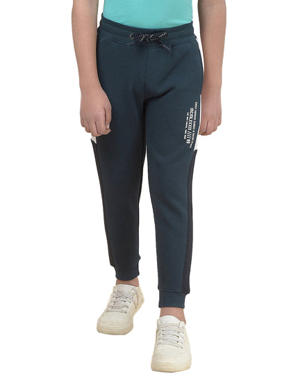 Casual Trackpant for Boys l Breathable & Soft with Color Fastness Regular Fit Fleece Fabric Self Design Pattern Drawstring Closure